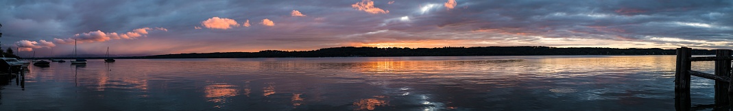 Sunset over lake near Munich, Germany, big panorama