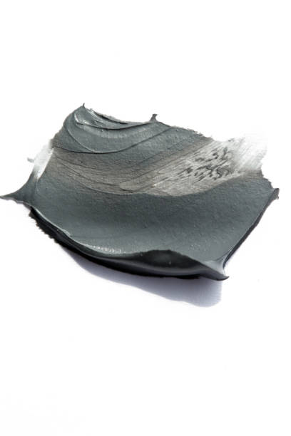 istock Clay or charcoal face mask stroke isolated on white 944830976