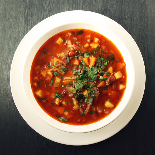 istock Tomato soup with red beans, potato and carrot. 944831212