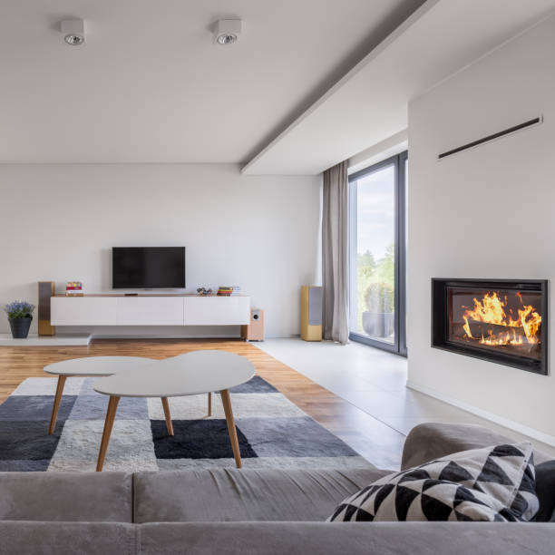 istock Family living room with fireplace 944831564