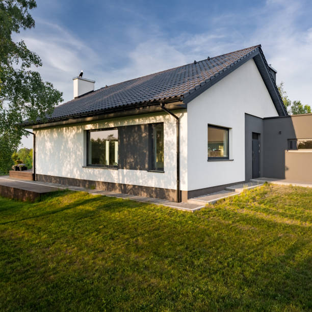 istock Cozy house with green lawn 944831596