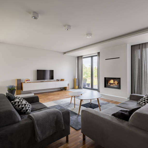 istock Luxurious living room with fireplace 944831616