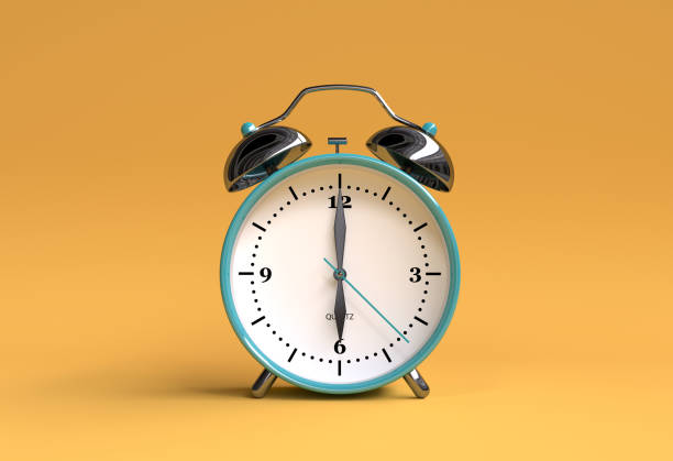 istock old alarm clock on yellow background - 6 o'clock - 3d illustration rendering 944837858