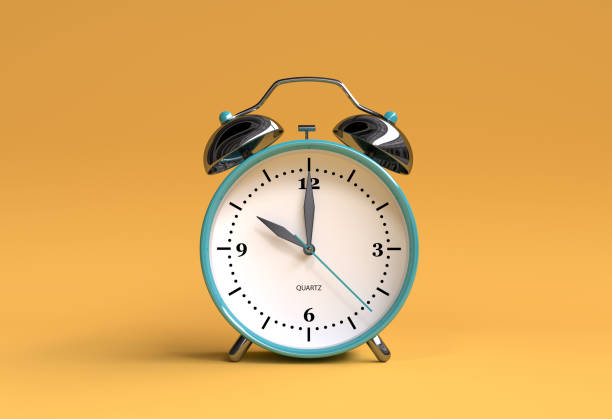 istock old alarm clock on yellow background - 10 o'clock - 3d illustration rendering 944837870