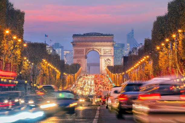 istock Famous Champs-Elysees and Arc de Triomphe at twilight in Paris 944841966