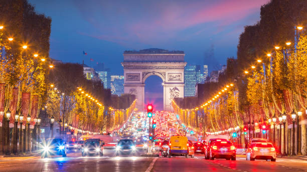 istock Famous Champs-Elysees and Arc de Triomphe at twilight in Paris 944842020