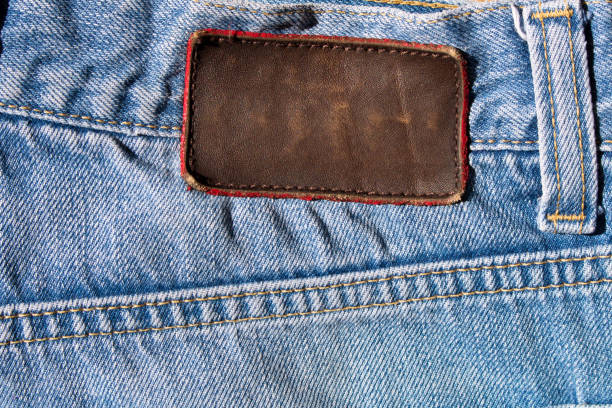 istock Blue jeans with a leather label on the back . The view from the top 944860050