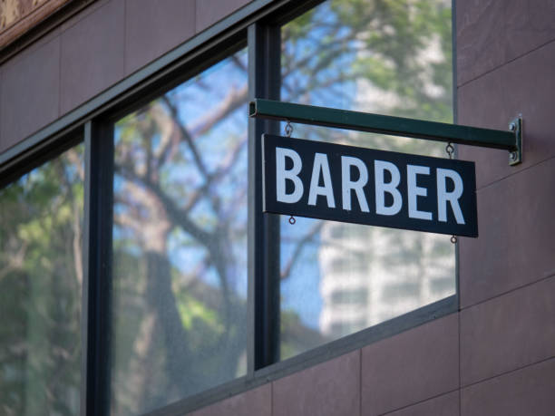 istock Modern Barber sign hanging outside the shop 944871582