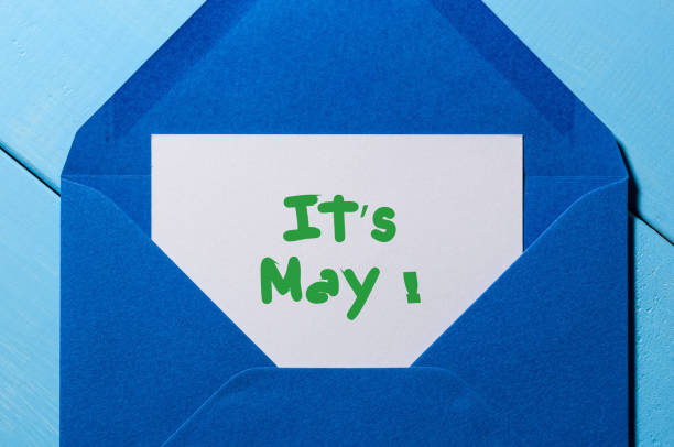 istock It's May - message at blue envelope. International Labor Day 944882808