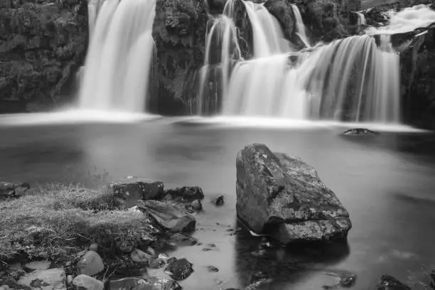 Waterfall idyllic black and white photography scenics landscape in Iceland