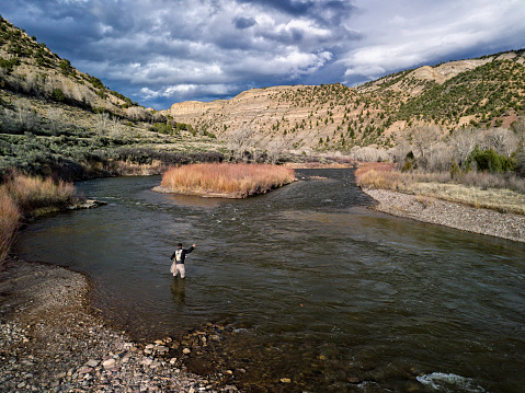 Flyfishing Colorado River at Sunset - Low angle view from water's surface.