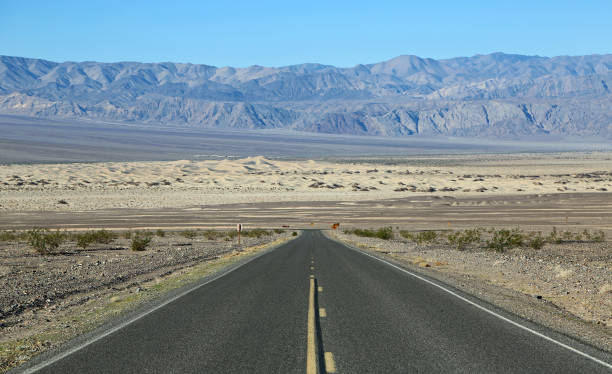 istock The road and mesquite flat sand dunes 944896996