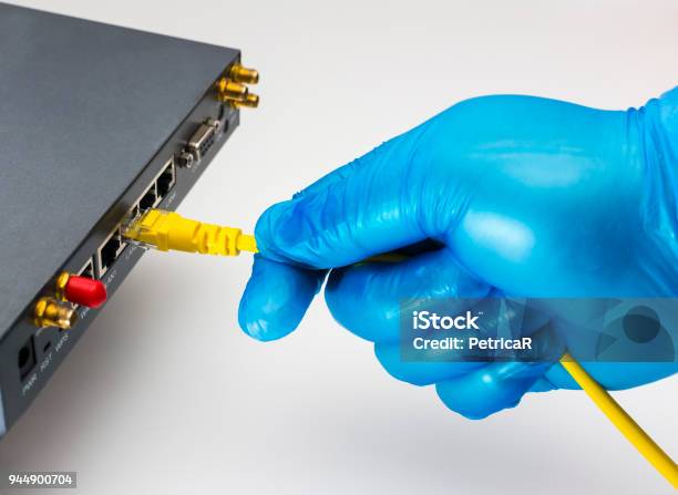 Safe Internet Connection Via Rj45 Cable Router Network Connection Stock Photo - Download Image Now