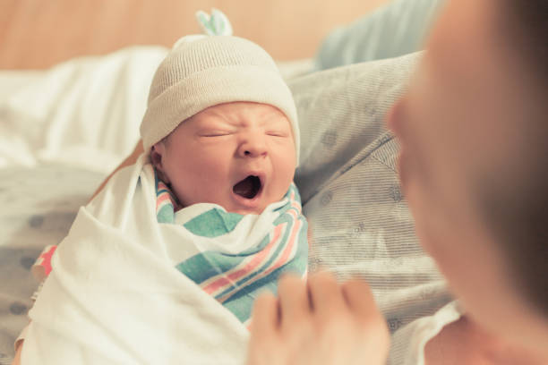 istock Sleepy baby yawning 944915006