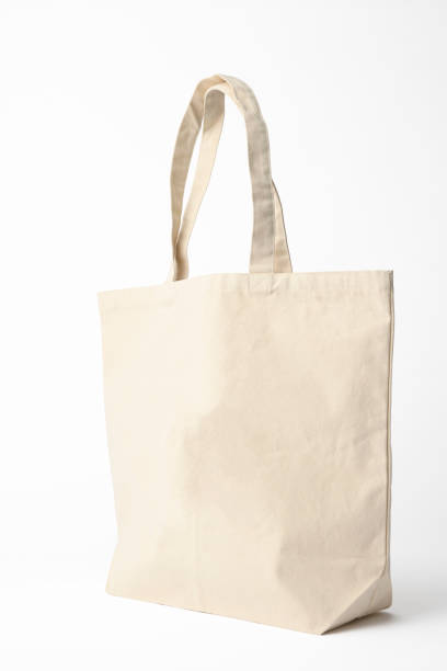 istock Isolated shot of blank canvas tote bag on white background 944919938