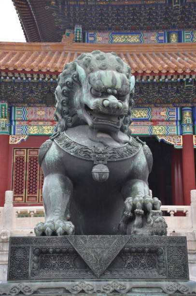 istock A large lion statue standing guard in the Forbidden City. 944935334
