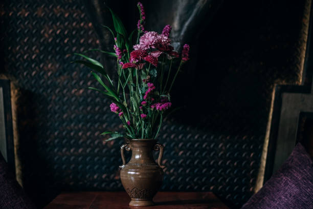 istock Vase of Purple Flowers 944938356
