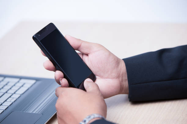 istock young business man using smart phone, business concept 944946852