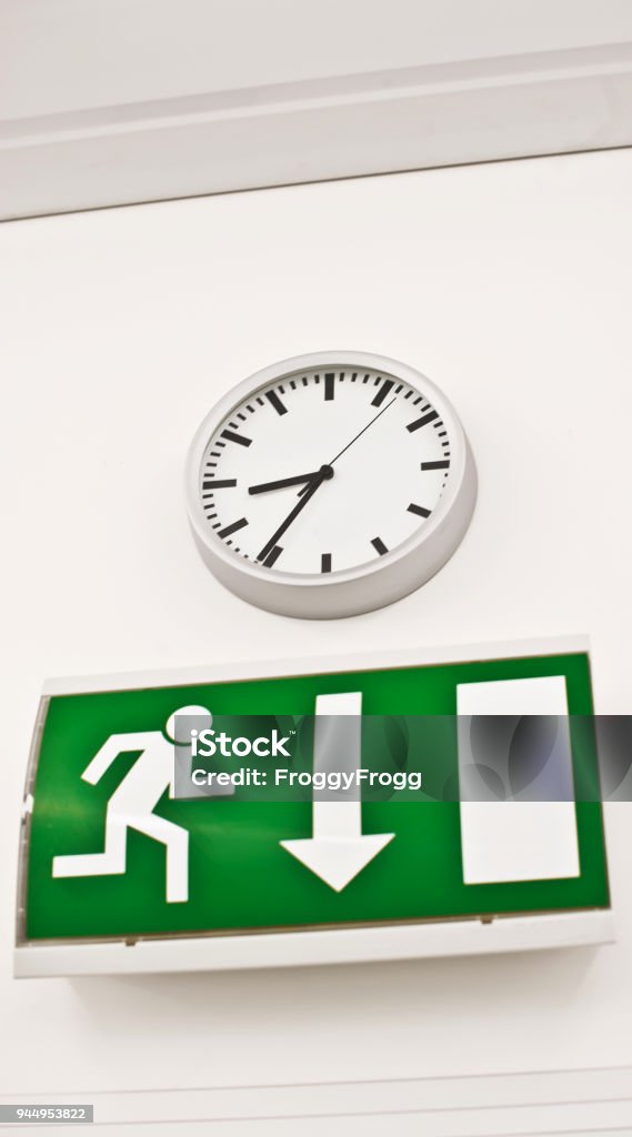 Clock Exit Sign Warning Sign Emergency Exit Sign Under A Wall Clock Stock Photo ...