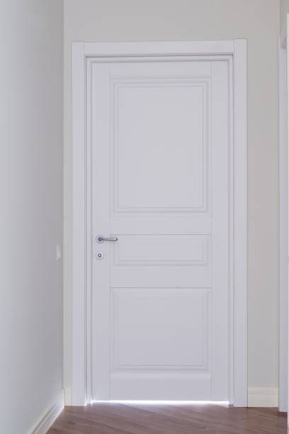 istock Closed white interior paint door in home interior 944957342