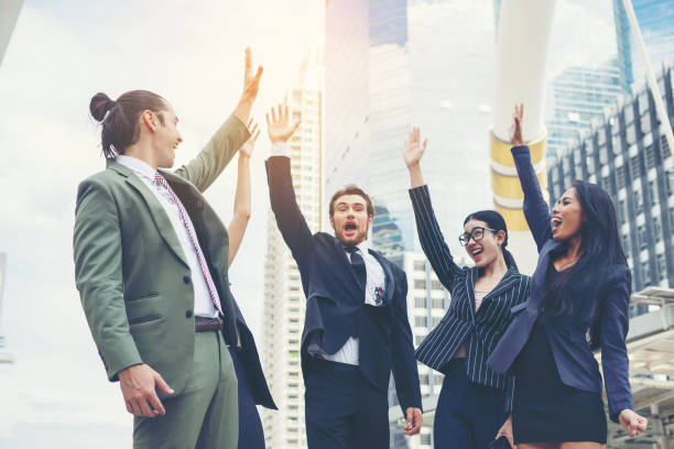 istock Close up of business people hands together. Teamwork concept. 944961404