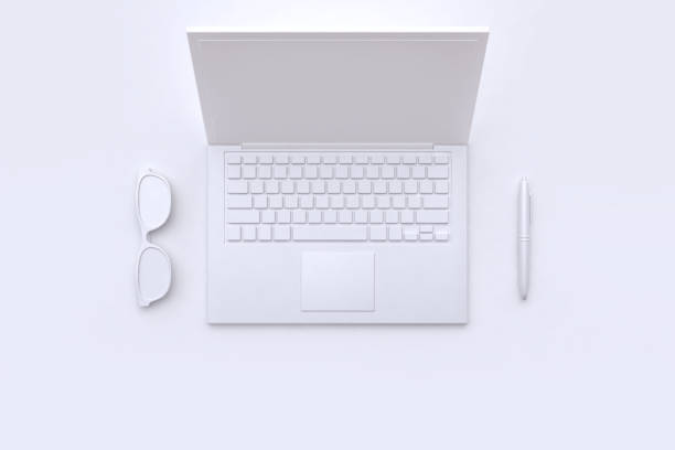 istock 3d rendering white scene abstract laptop pen and glasses technology concept 944965928