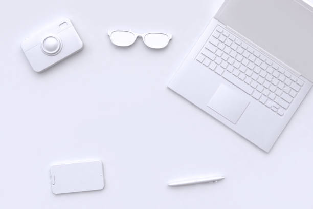 istock 3d rendering white scene abstract laptop camera glasses pen smart phone blank space technology concept 944965978