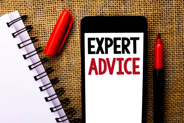 istock Handwriting text Expert Advice. Concept meaning Professional Recommendation Suggestion Help Assistance written on Mobile Phone on the jute background Marker and Notebook next to it. 944969620