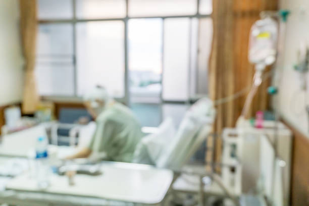 istock Blurred patient in hospital room. 944969936