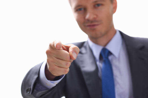 istock Businessman points a finger at someone who 944976108