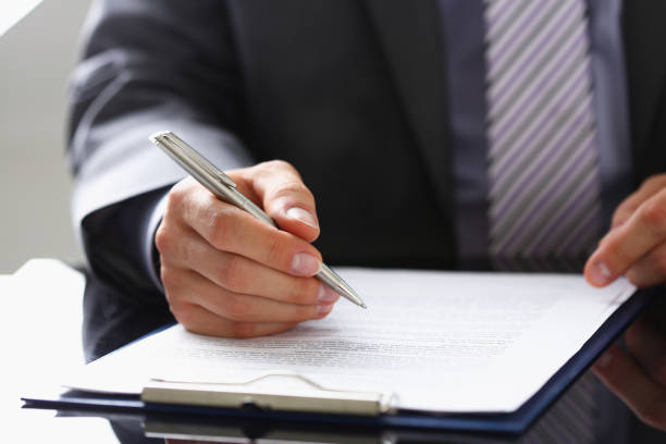 istock Male arm in suit and tie fill form clipped 944976152