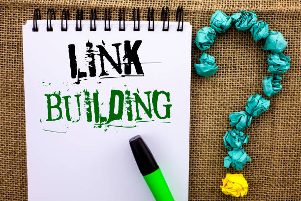 Writing note showing  Link Building. Business photo showcasing Process of acquiring hyperlinks from other websites Connection written on Notebook Book on the jute background Marker Ask for.