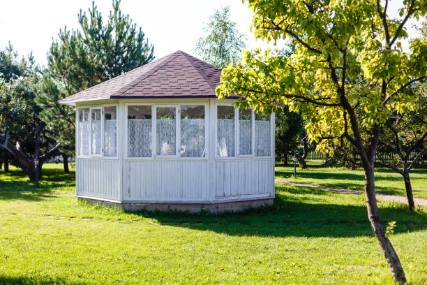 White pavilion in the garden.