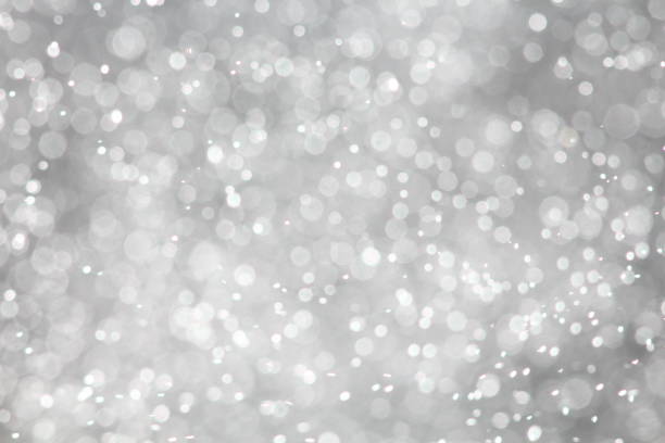 istock Abstract sparkles particle moving small large defocus different crystal plan overlay 944979634