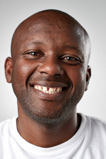 istock Studio portrait of African man smiling 944983690