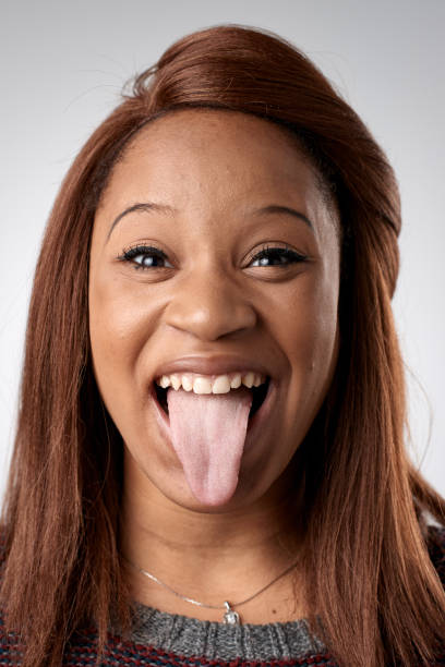 istock Studio portrait of mixed race woman making a silly expression 944983746