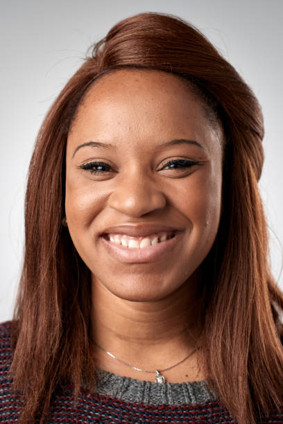 istock Studio portrait of mixed race woman smiling 944983748