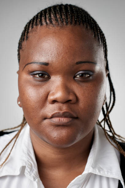 istock Studio ID portrait of African woman with serious expression 944983834