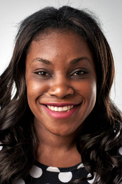 istock Studio portrait of black woman smiling 944983842