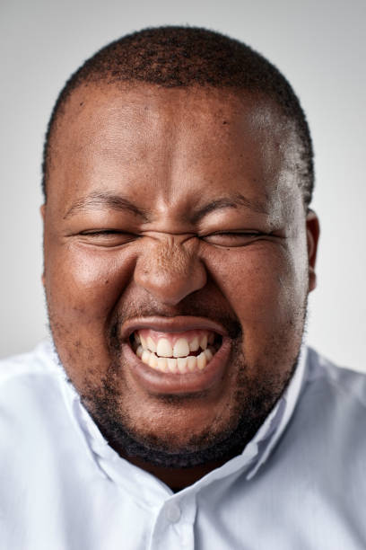 istock Studio portrait of African man making a silly expression 944984122