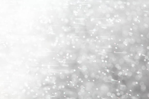 istock Abstract sparkles particle moving small large defocus different crystal plan overlay 944984162