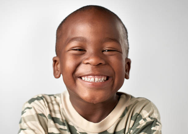 istock Studio portrait of cute african boy smiling 944986206