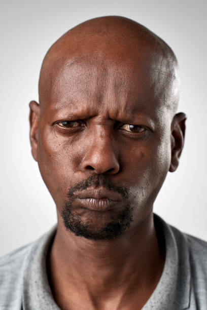 istock Studio portrait of African man making a silly fun face expression 944986210