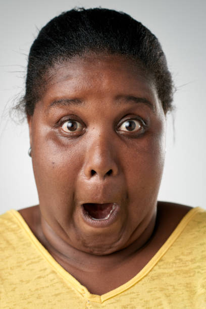 istock Studio portrait of African woman making a silly face 944986562