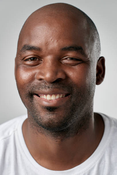 istock Studio portrait of African man smiling 944986756