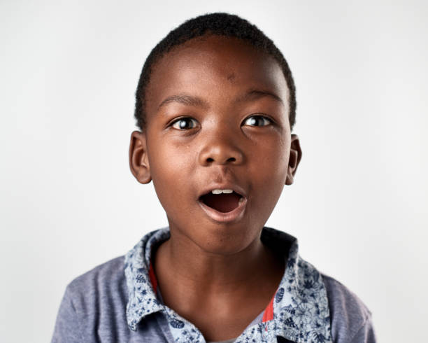 istock Studio portrait of African boy looking surprised 944986786