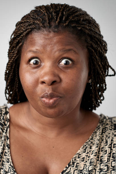 istock Studio portrait of African woman making a silly face 944986996