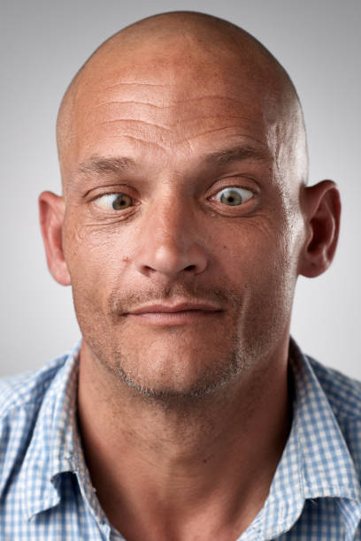 istock Studio portrait of caucasian man making a silly face 944987070