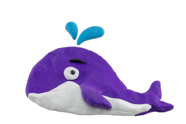 istock close up play dough whale isolated on white background. 944987386