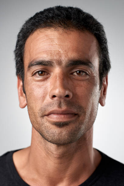 istock Studio ID portrait of caucasian man with serious expression 944987706